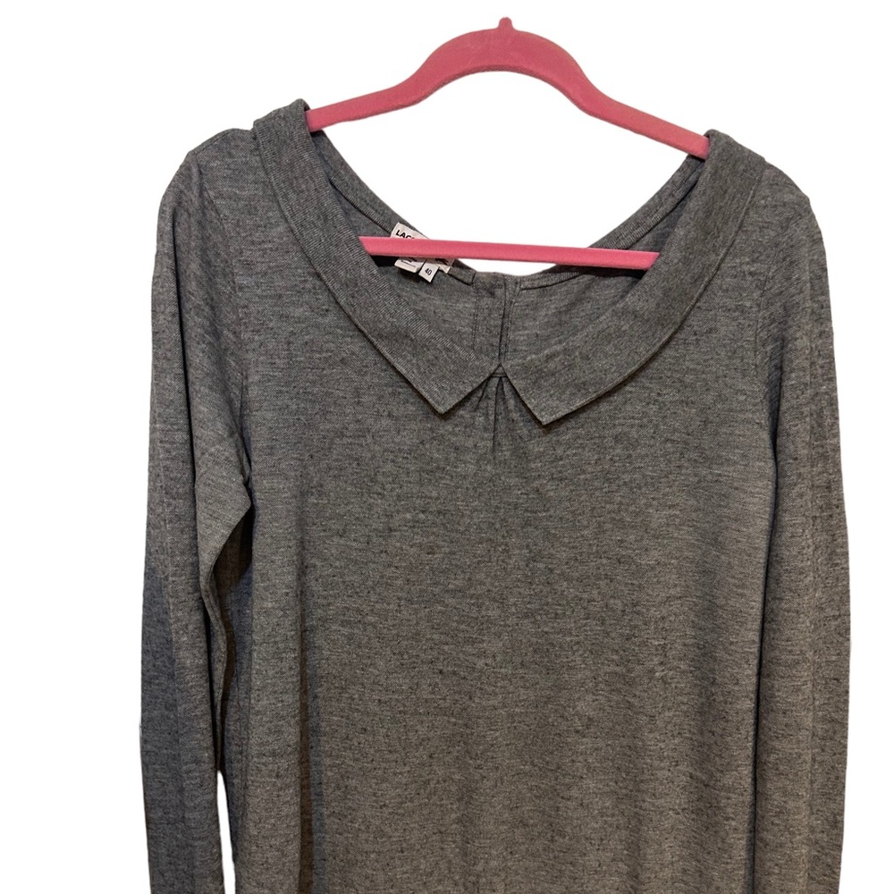 Vintage Lacoste button down the back long-sleeve metal emblem on the bottom